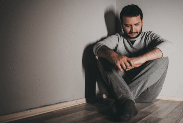 Person struggling with mental health and addiction in need of dual-diagnosis treatment